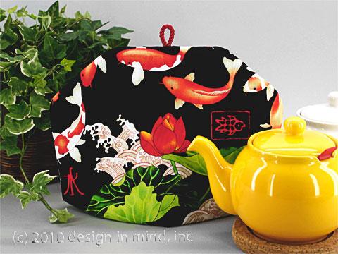 Tea cozies featuring fabrics with intense colors and Asian themes.
